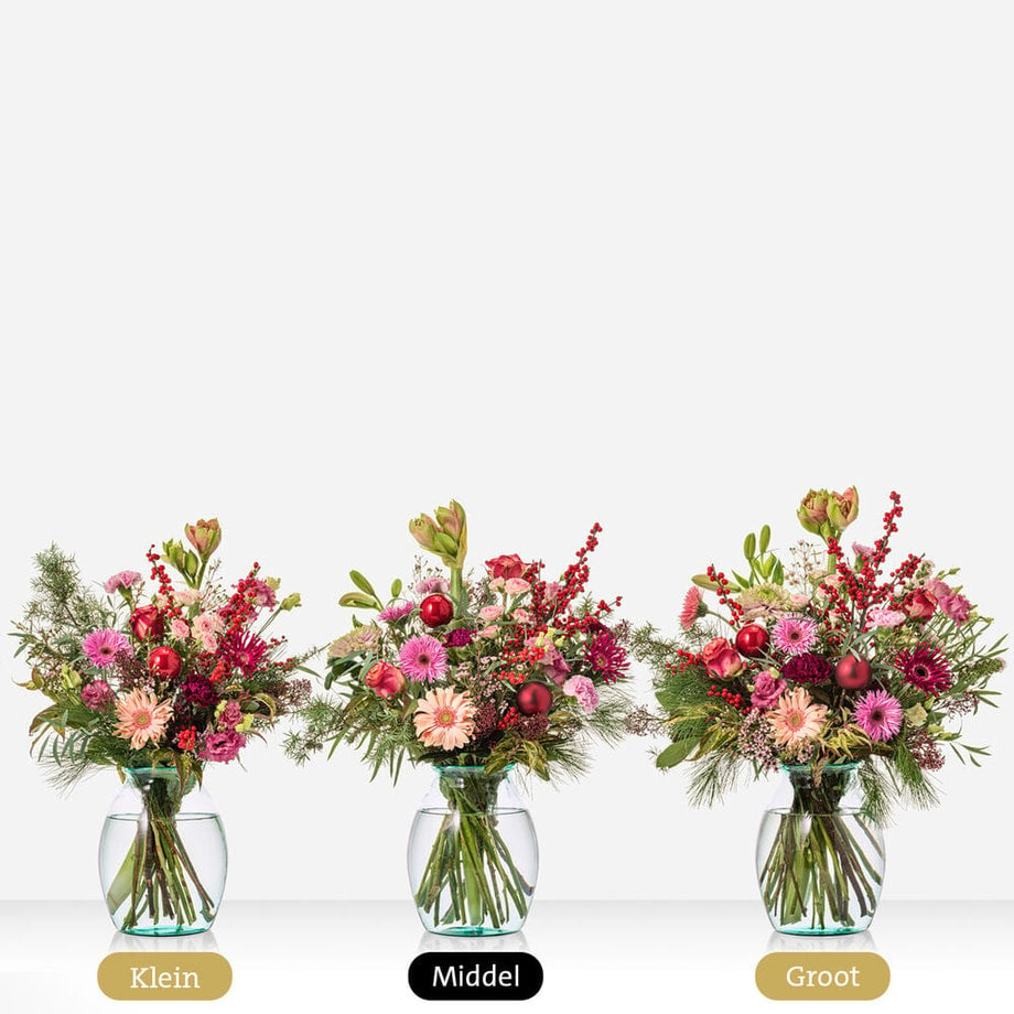 Kerstboeket in klein, middel en groot formaat met rozen, gerbera’s en kerstdecoratie.