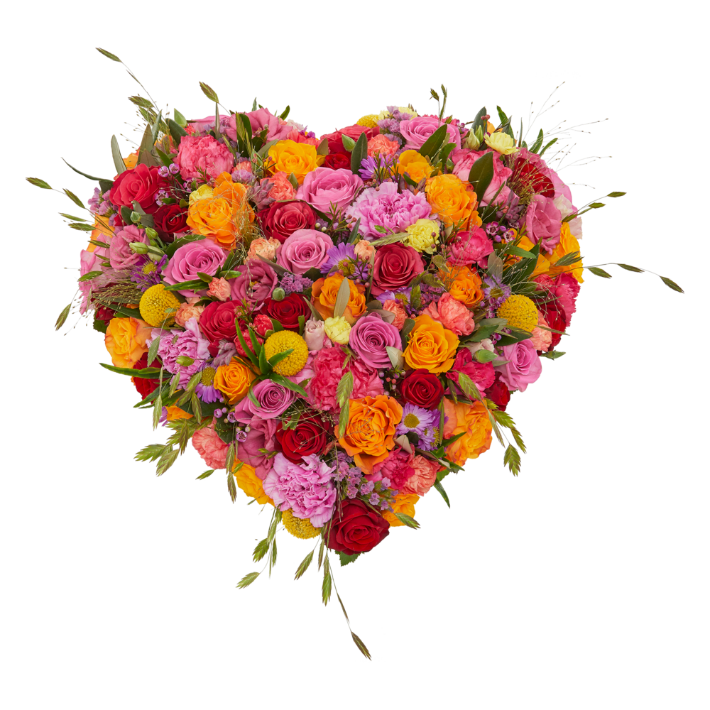 Hartvormig rouwstuk met rozen, anjers en warme gekleurde bloemen