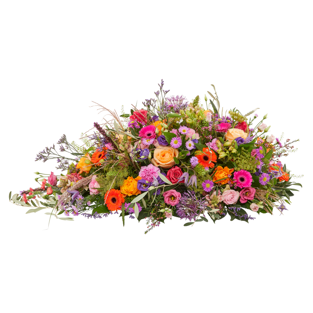 Ovaal rouwstuk met rozen, gerbera en warme seizoensbloemen